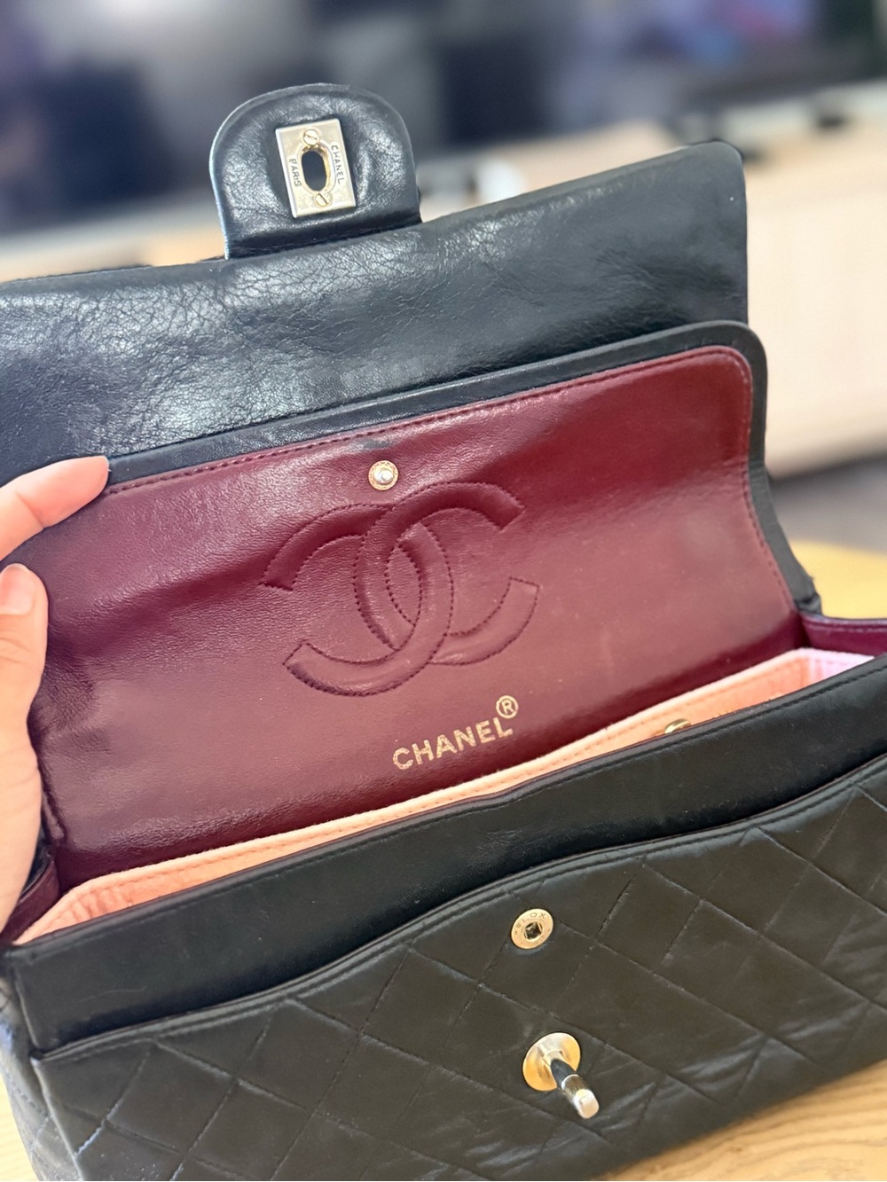 CHANEL Black Quilted Shoulder Bag with Burgundy Interior
